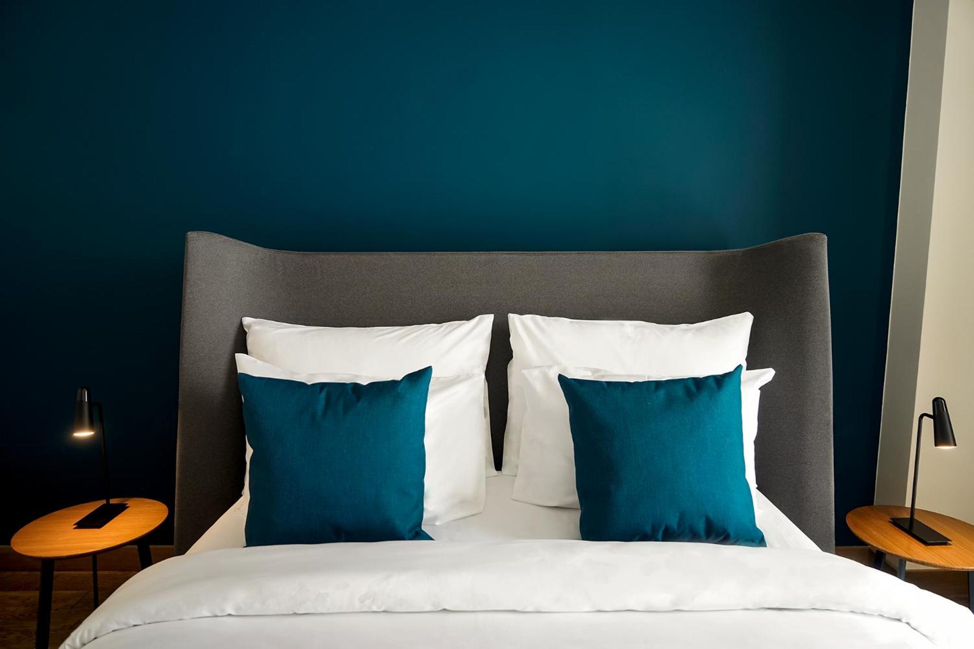 Gudauri Lodge 部屋 写真 A bed with cushions